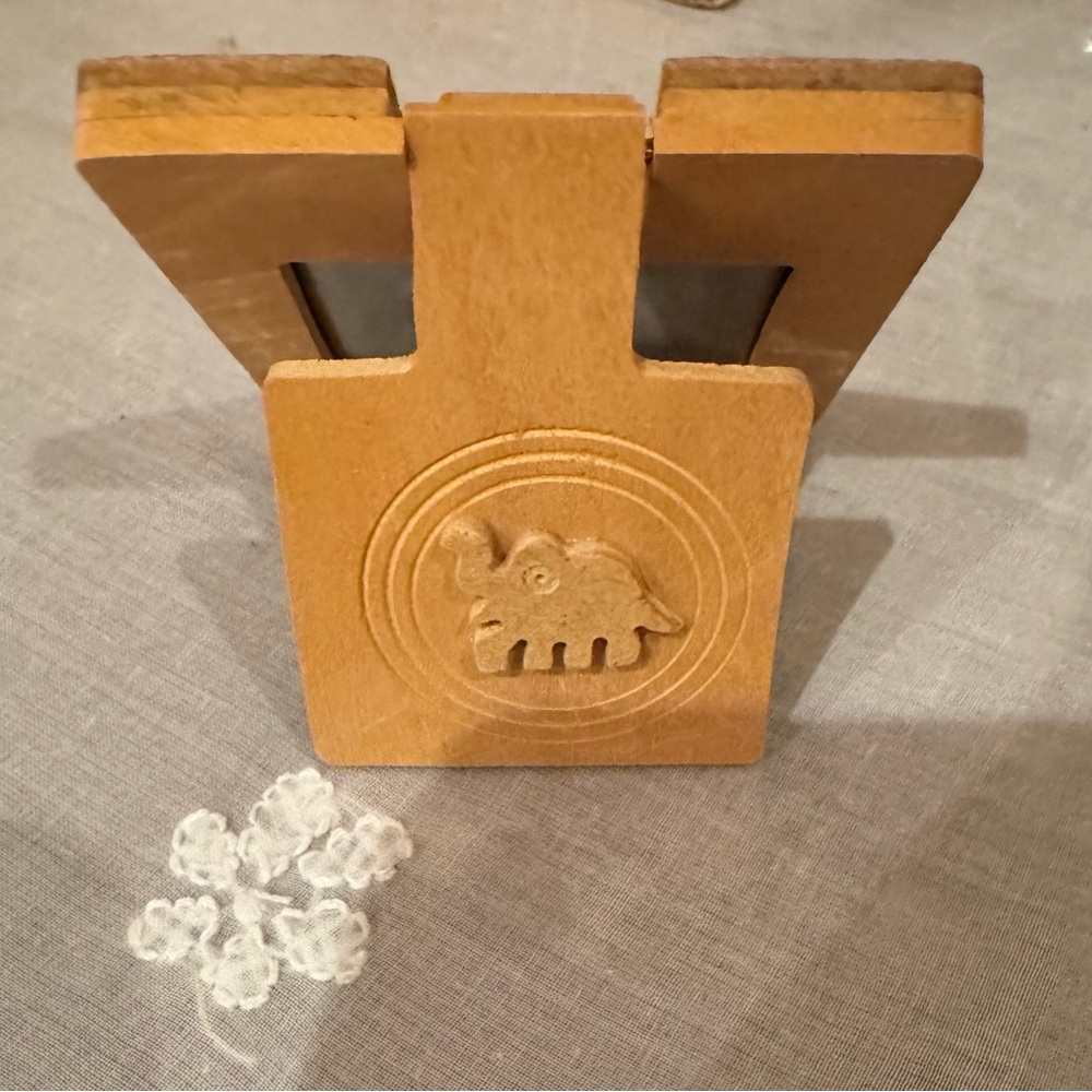 Carved Wooden Elephant Decor Piece. Size: 3”x2.5”